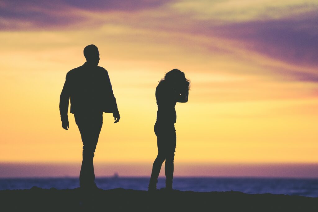 silouette of couple upset
